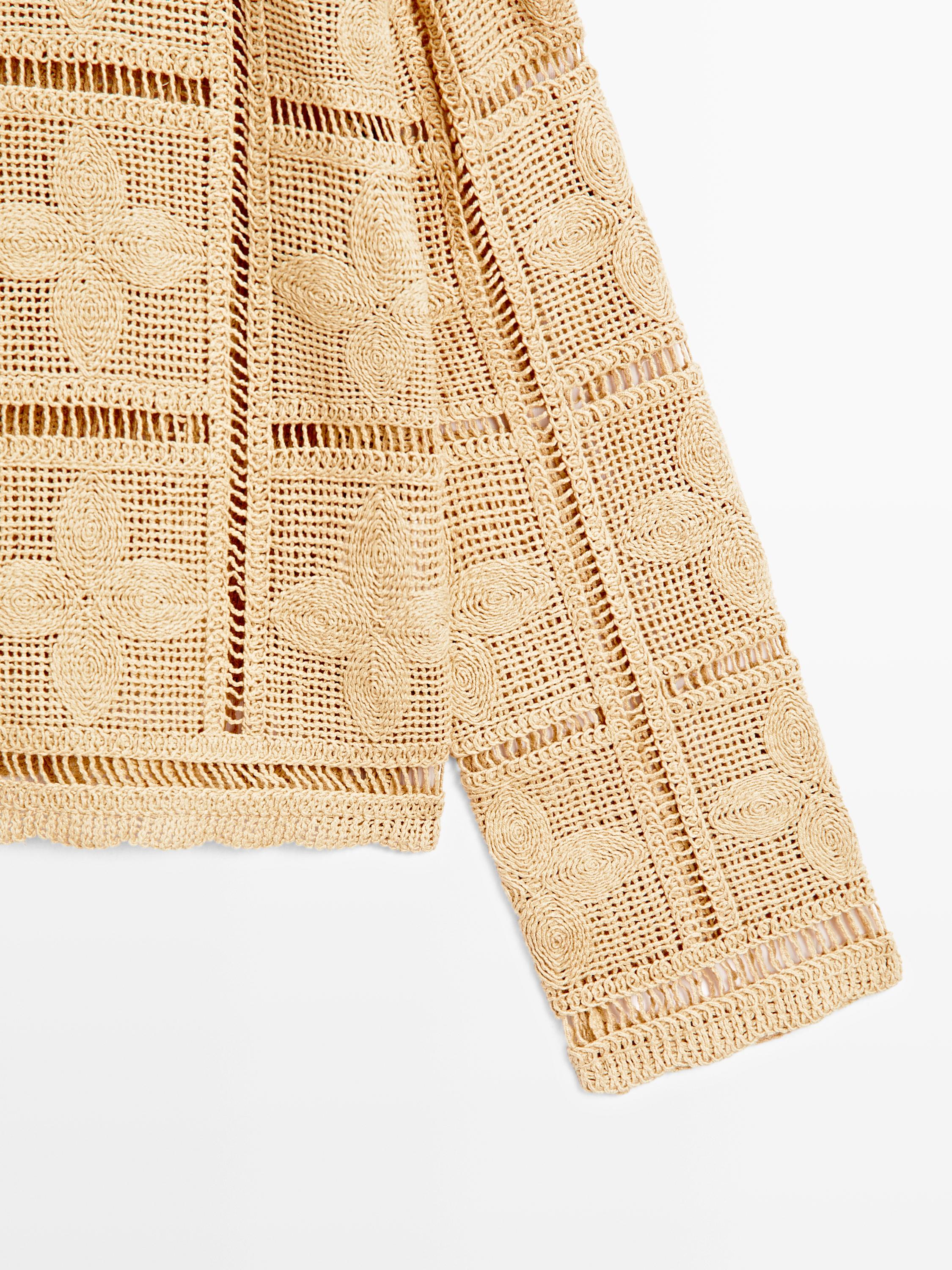 Veste en maille ajourée au crochet