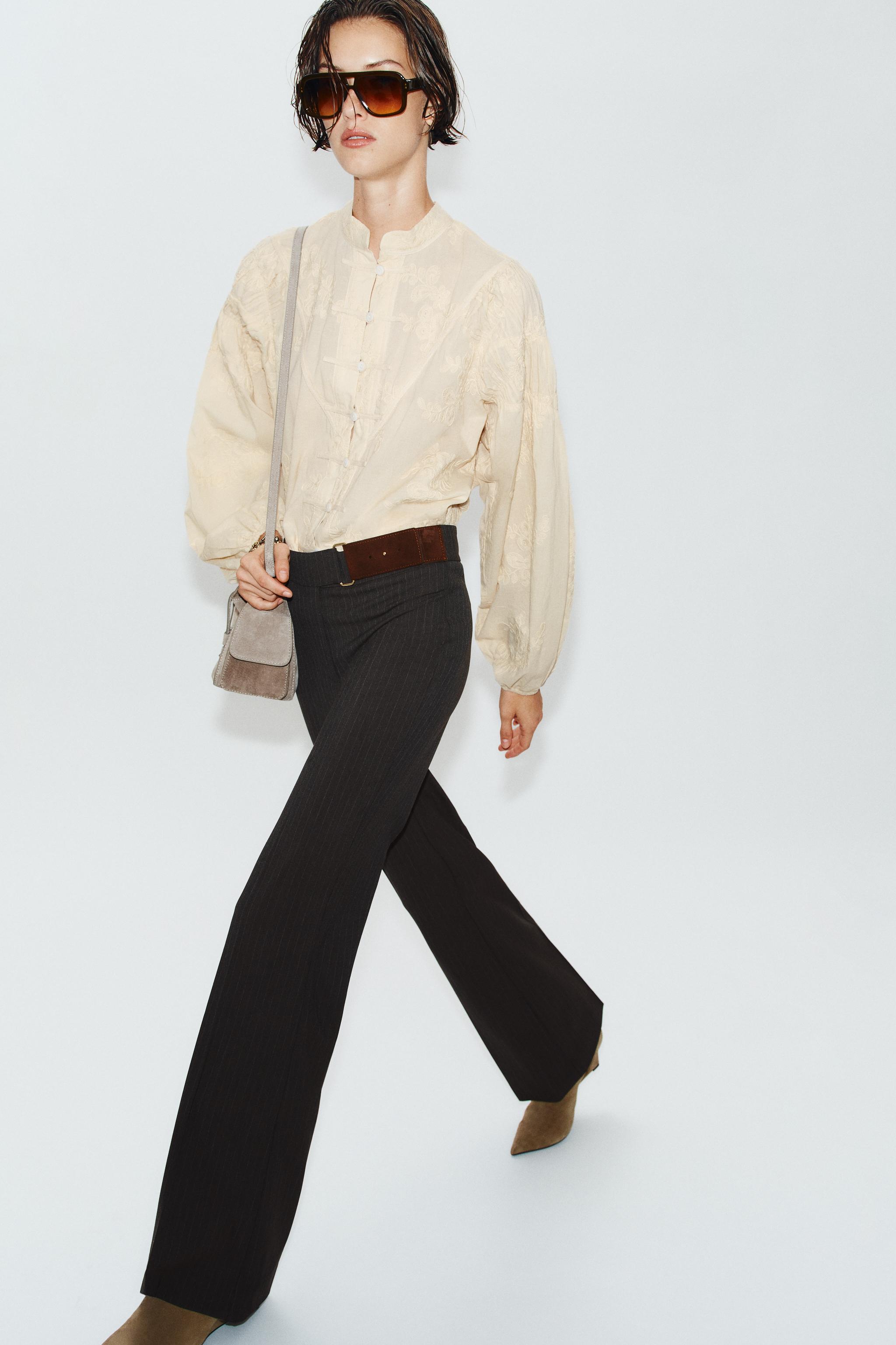 BUCKLE FLARE PANTS