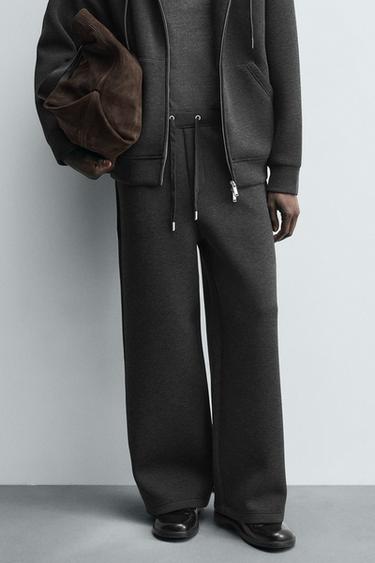 بنطلون رياضي تقني بقصة واسعة - رمادي داكن الخاص بـ Zara
