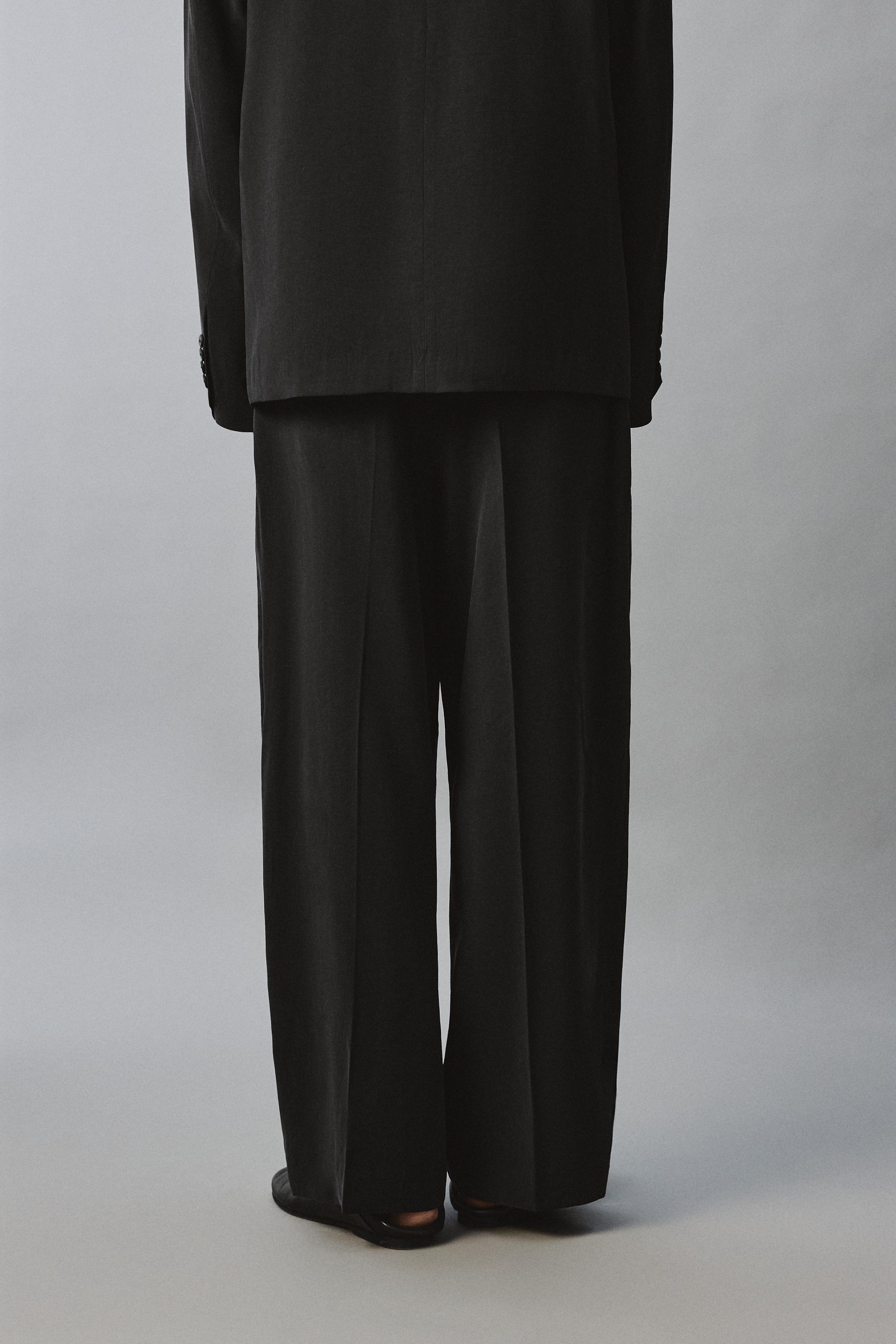 RELAXED FIT FLOWY PANTS