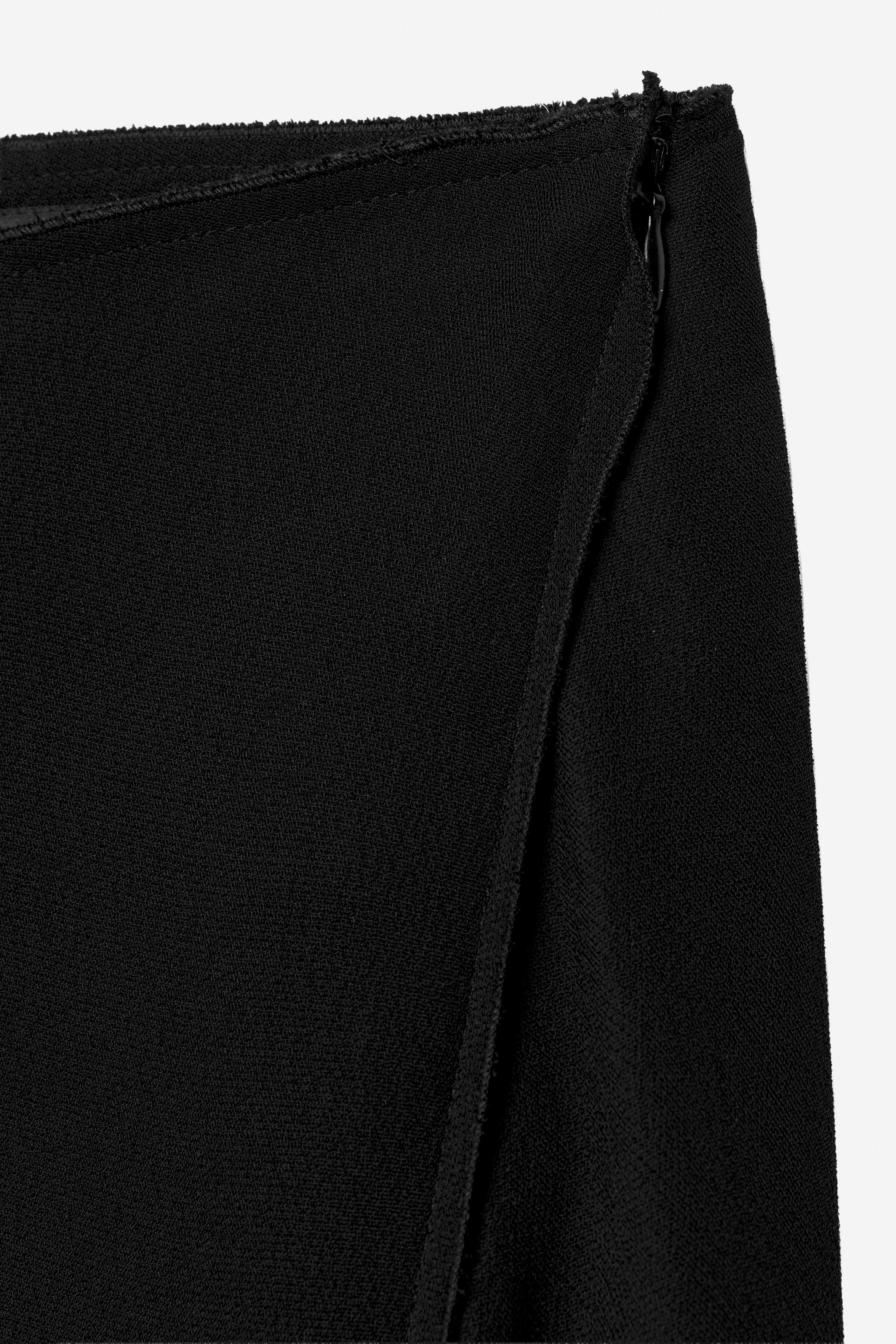 ASYMMETRIC FRINGED SKIRT - THE ITEM