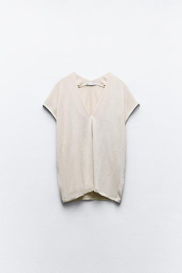 TOP PUNTO ESCOTE PICO - Beige claro de Zara