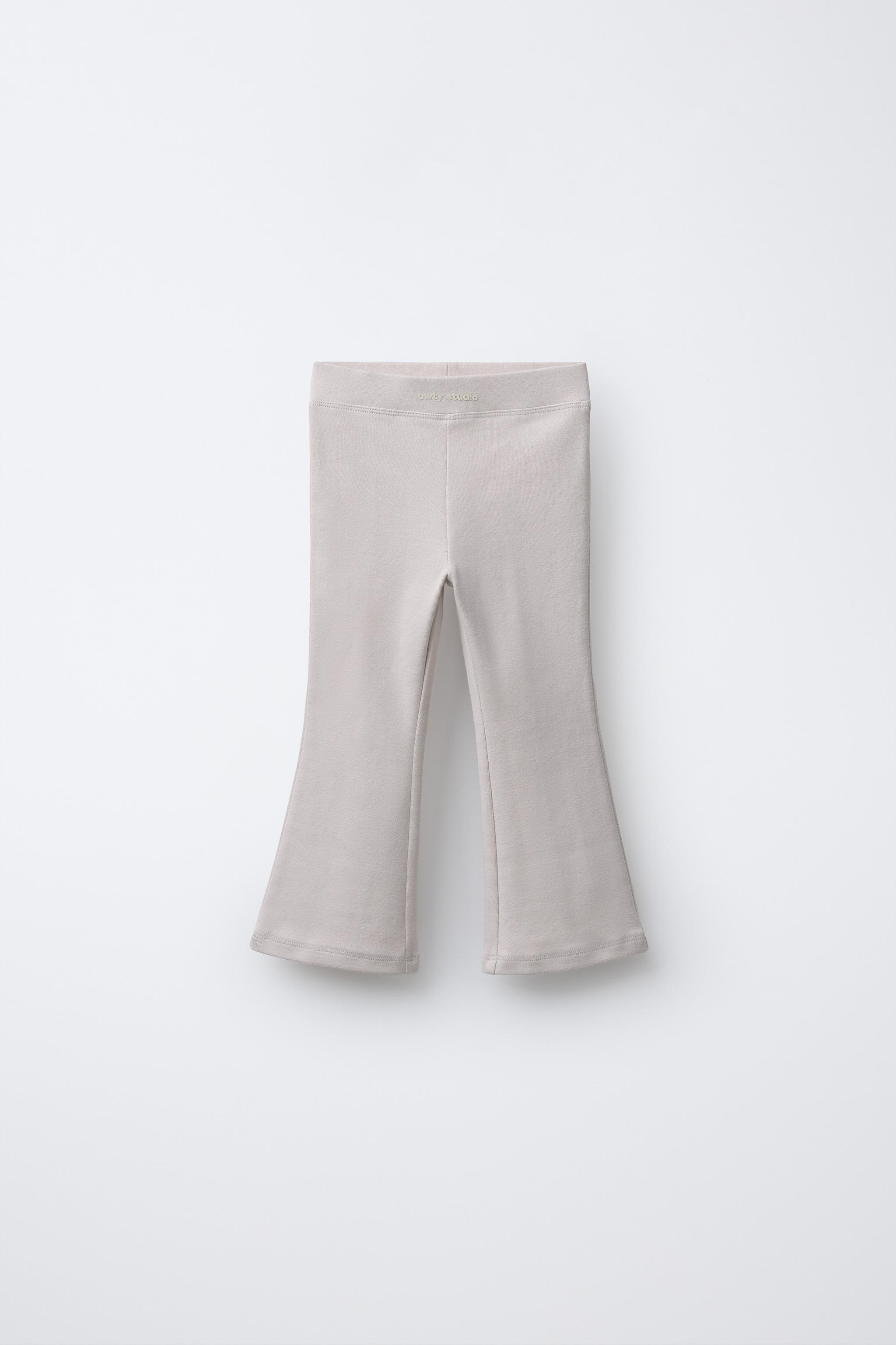 PANTALON EN MOLLETON FLARE À INSCRIPTION RELIEF