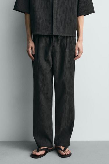 RELAXED FIT RAISED FABRIC TROUSERS - Dark grey by Zara