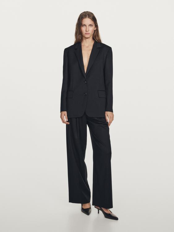 Pleated extra fine wool trousers