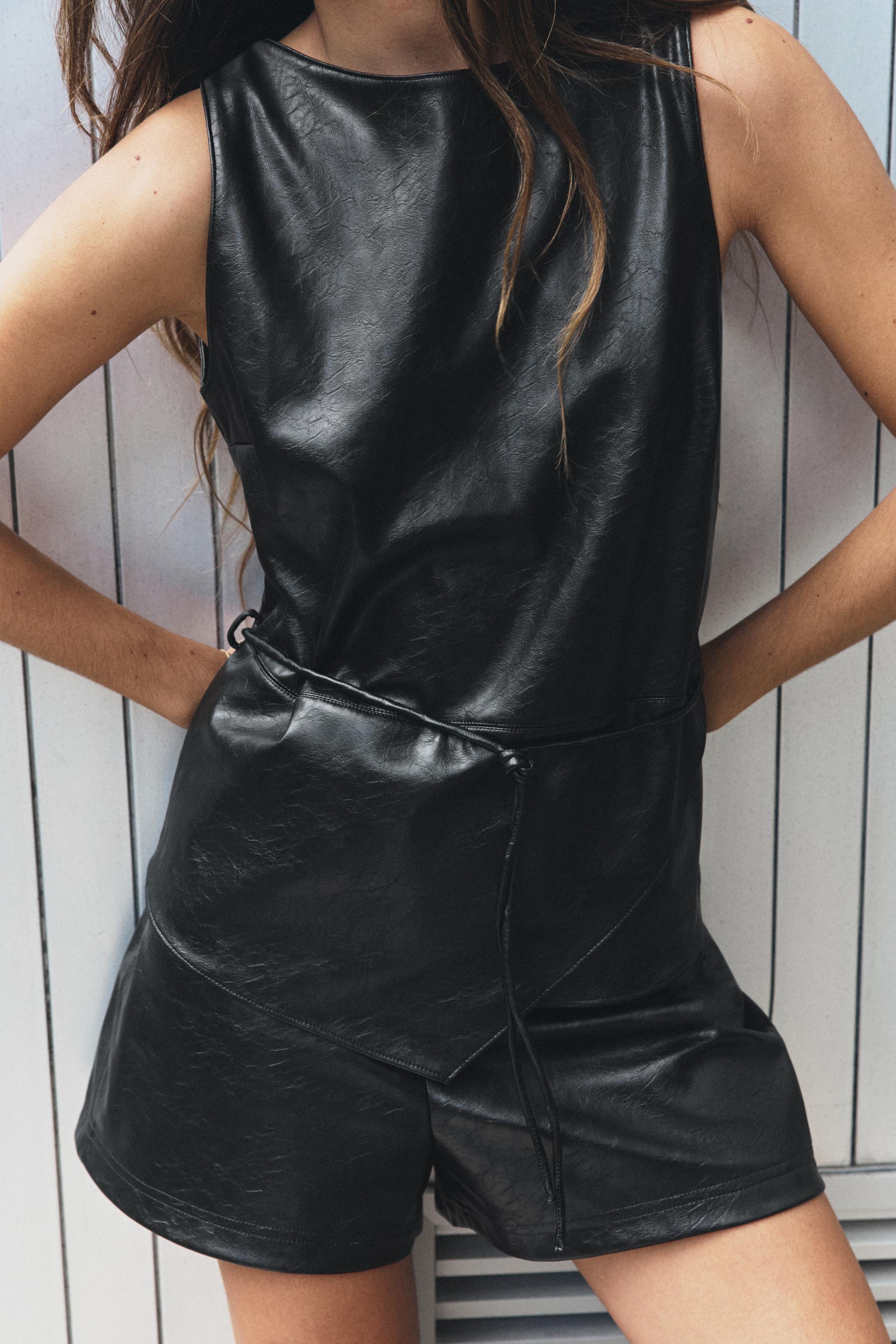 BELTED FAUX LEATHER TOP