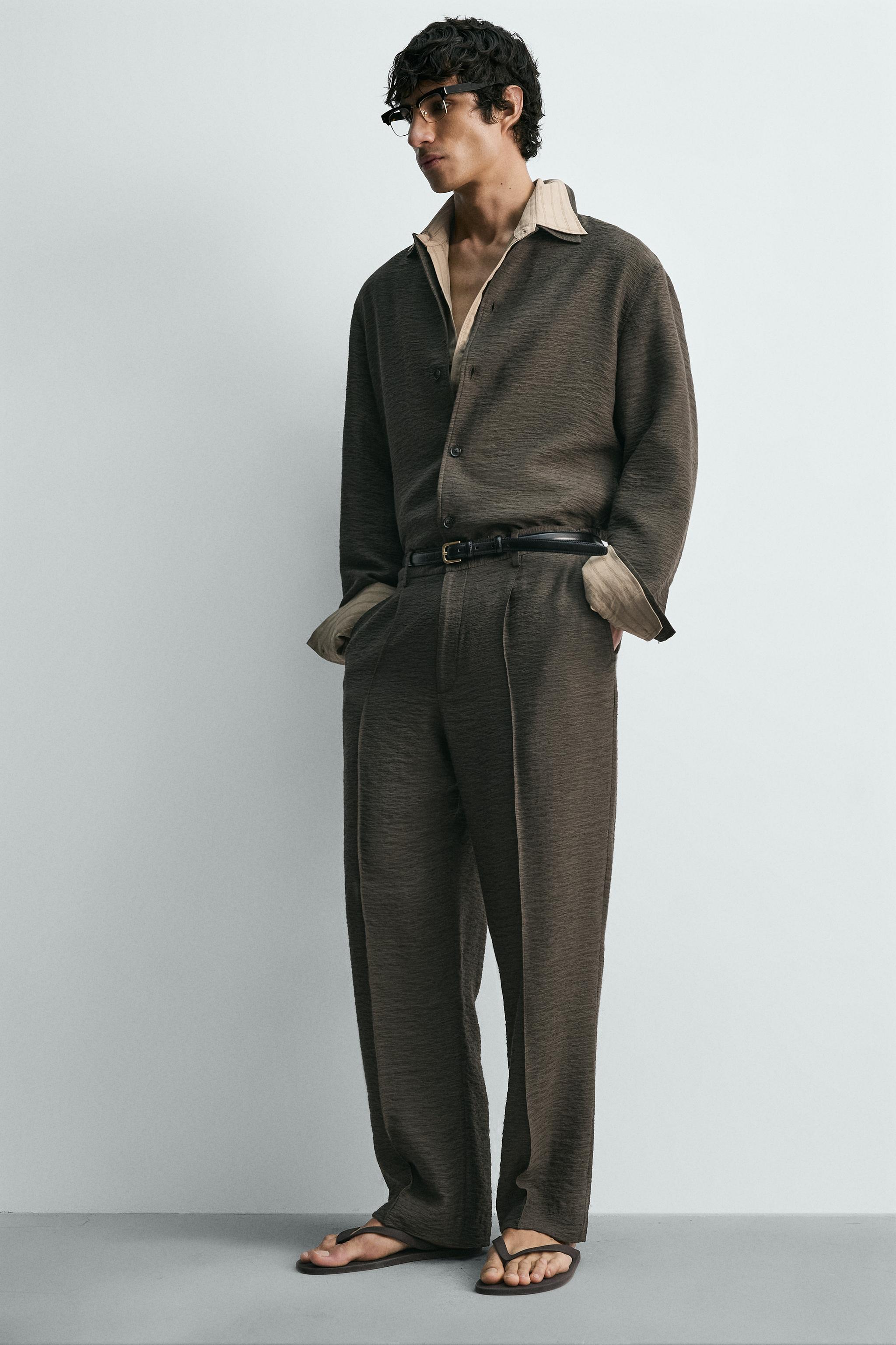 FLOWY TEXTURED PLEATED PANTS