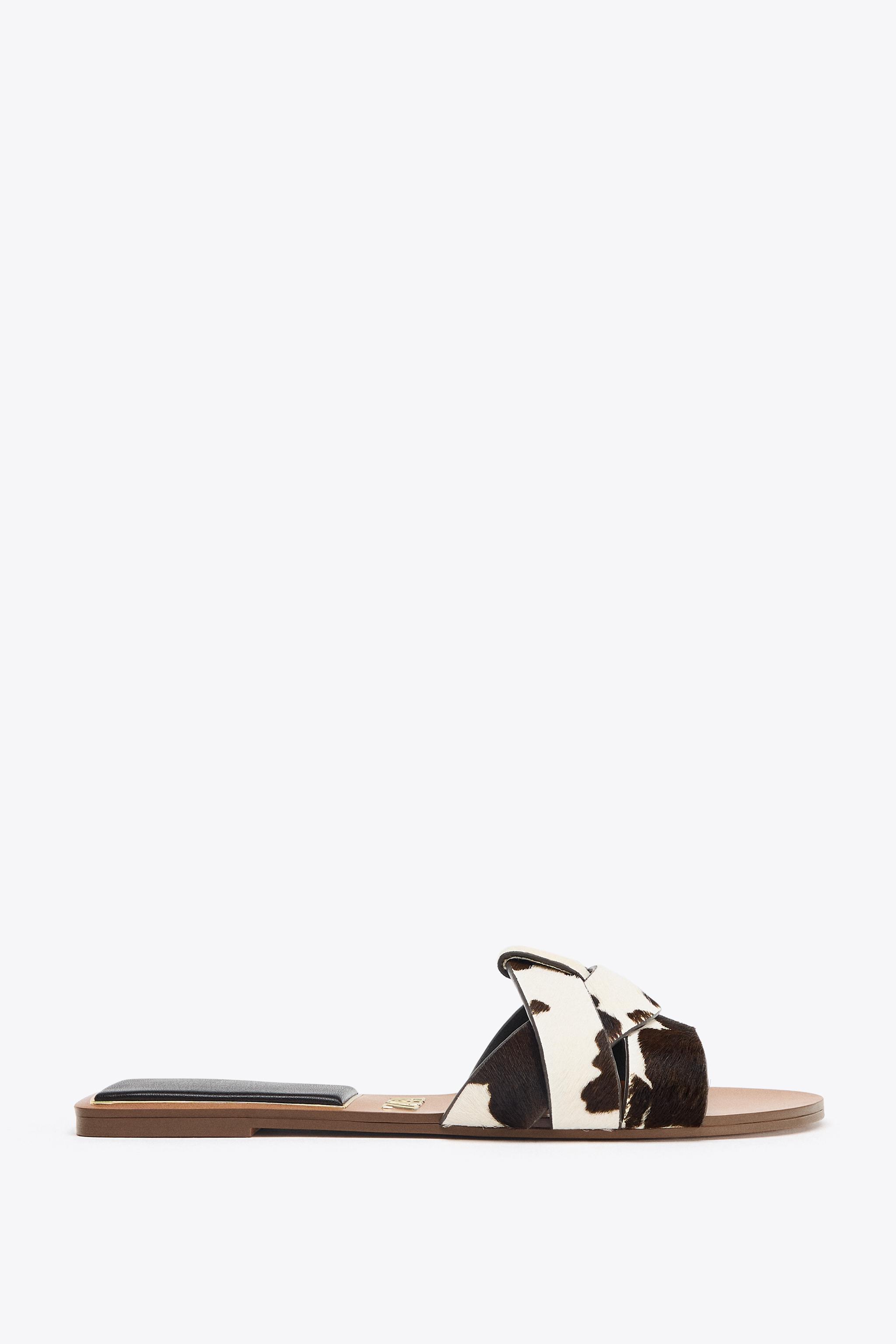 SANDALES PLATES EN CUIR