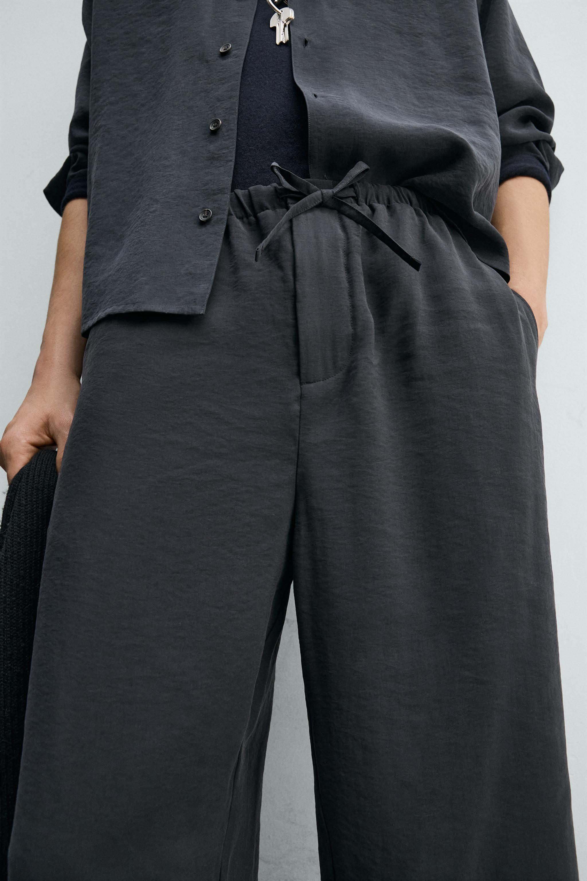 RELAXED FIT FLOWY PANTS