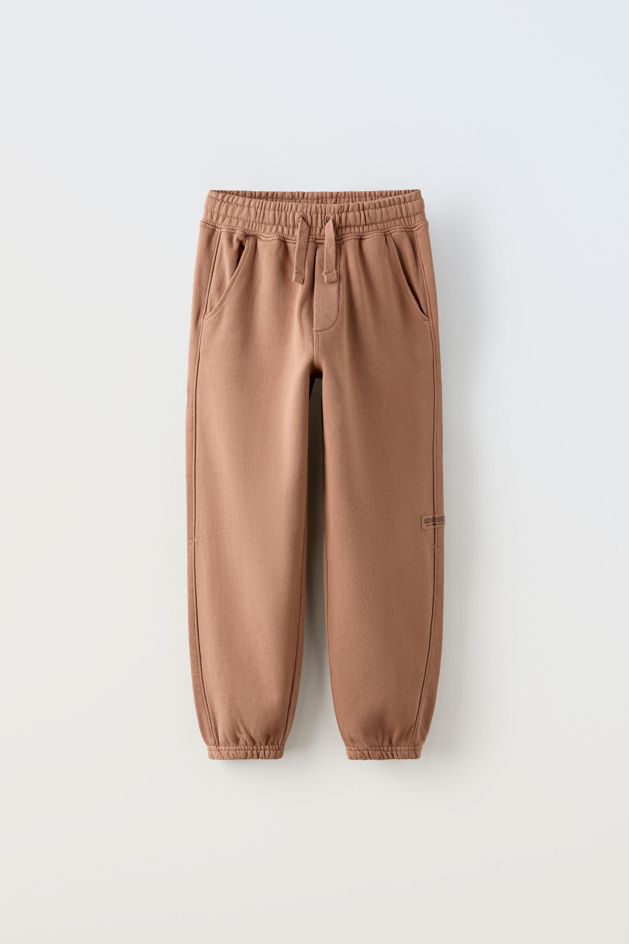 PLUSH PANTS WITH LABEL - Reddish