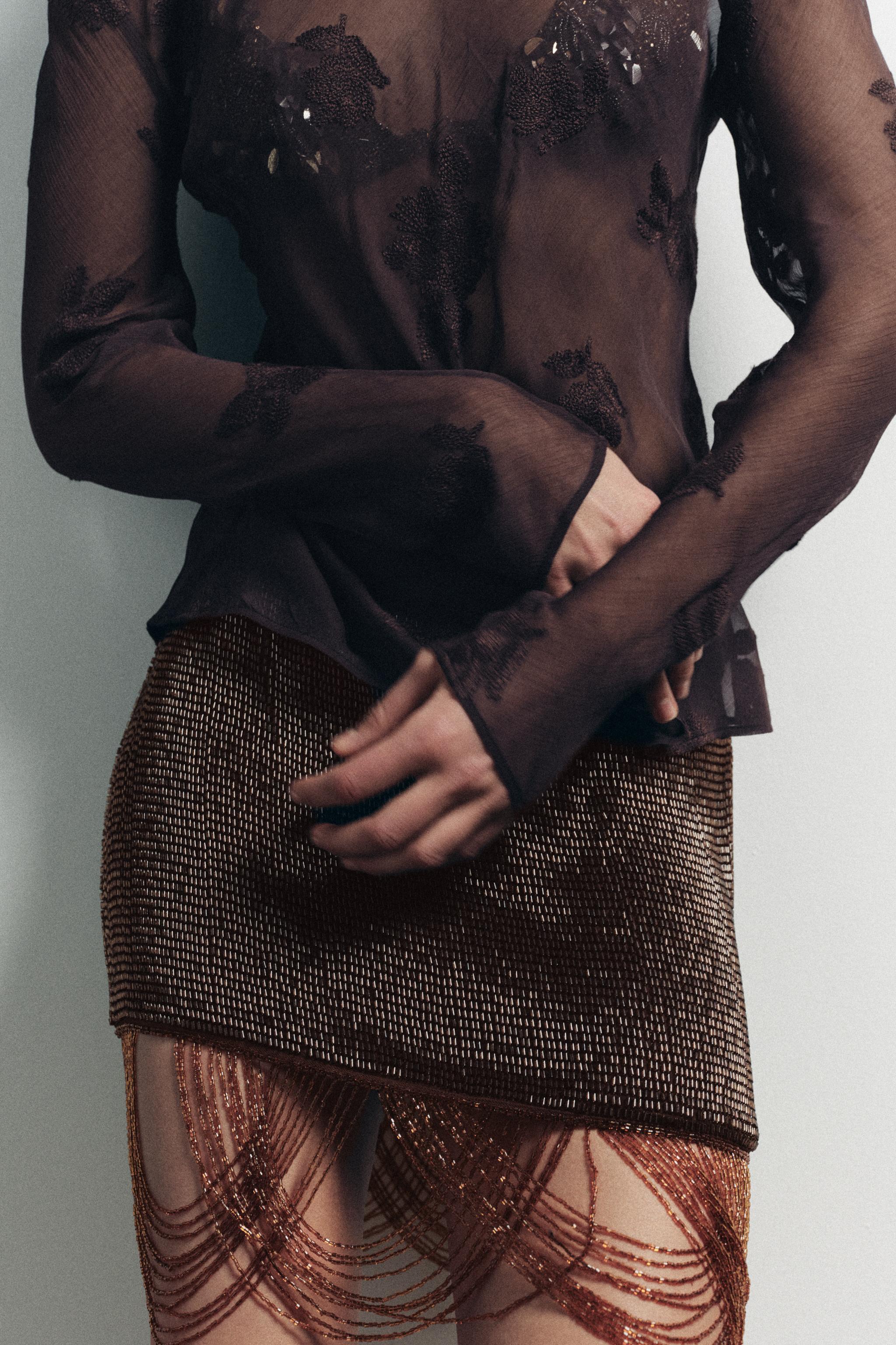 BEADED FRINGE MINI SKIRT