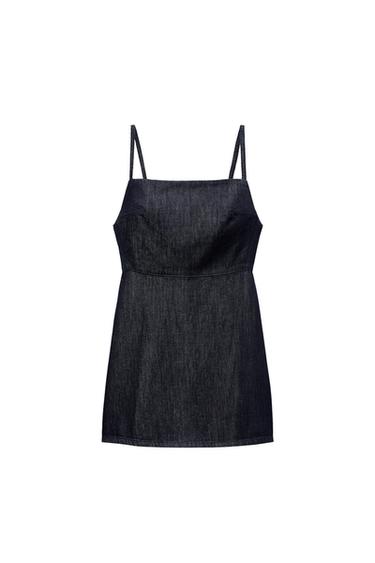 Front view of spaghetti strap dress in dark color.
