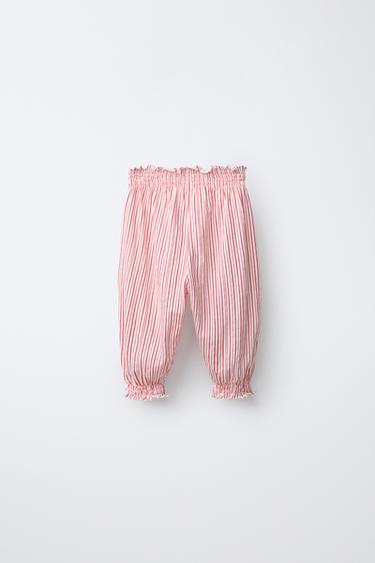 PANTALON DE JOGGING À RAYURES - Écru / Rouge de Zara - Image 1