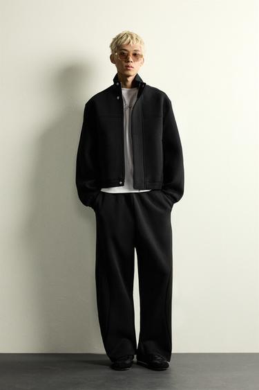 PANTALÓN RELAXED FIT PLIEGUES - Negro de Zara - Imagen 0