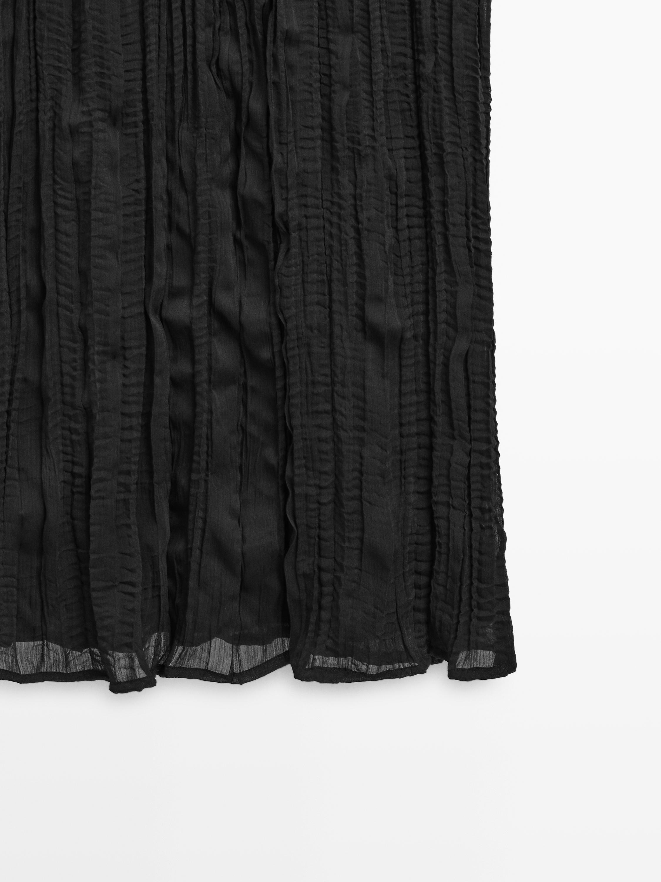 Robe longue combinée plissée
