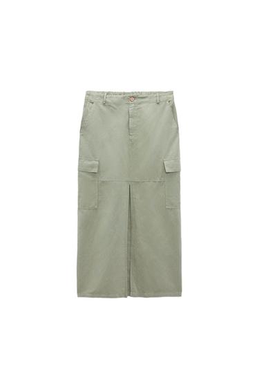 Olive green long skirt with cargo pockets and front slit. Button waist and belt loops. White background.