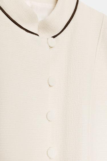 VESTE AJUSTÉE À LISERÉS EN CONTRASTE - Écru de Zara - Image 7