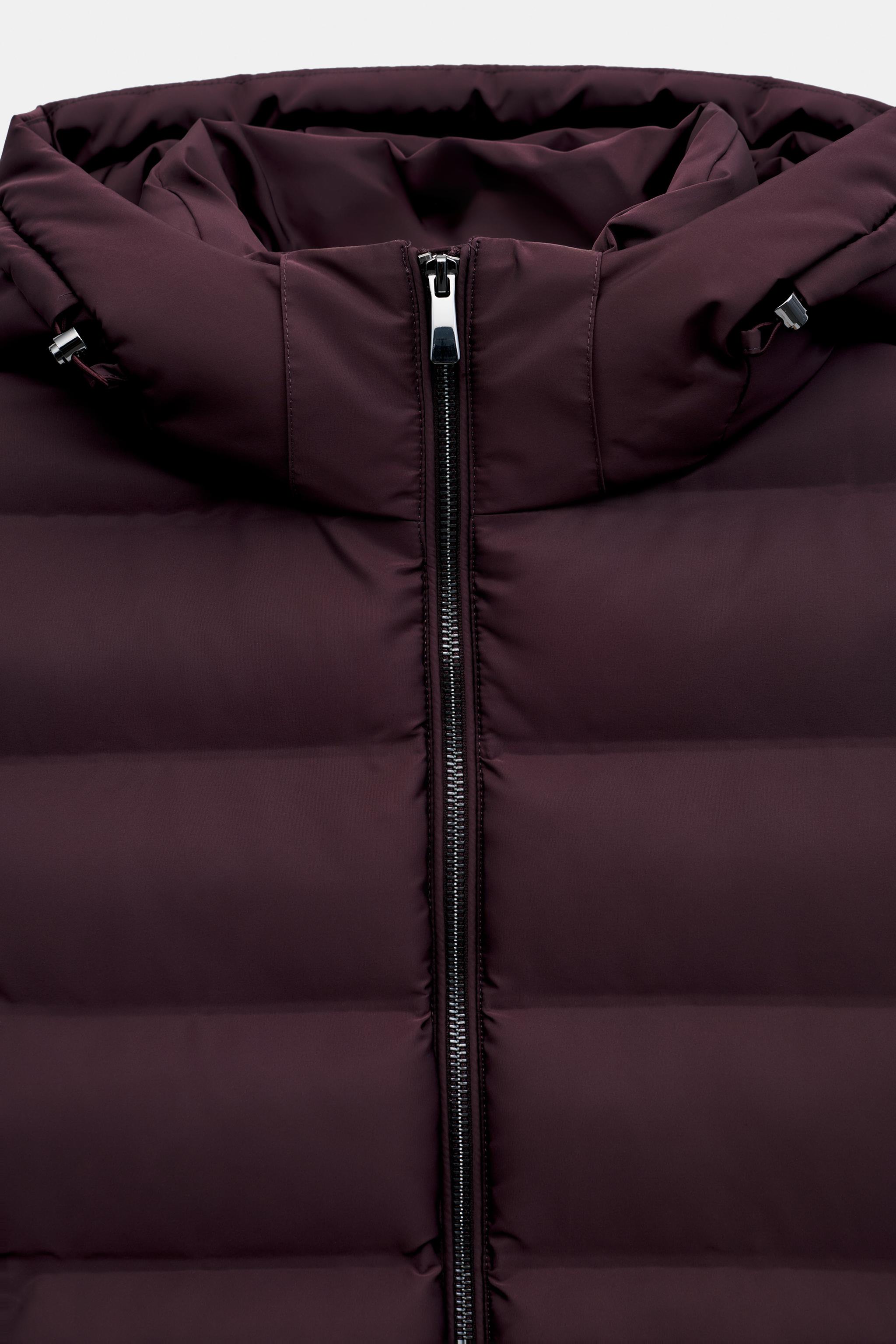 ANORAK MATELASSÉ À CAPUCHE DÉPERLANT ET COUPE-VENT