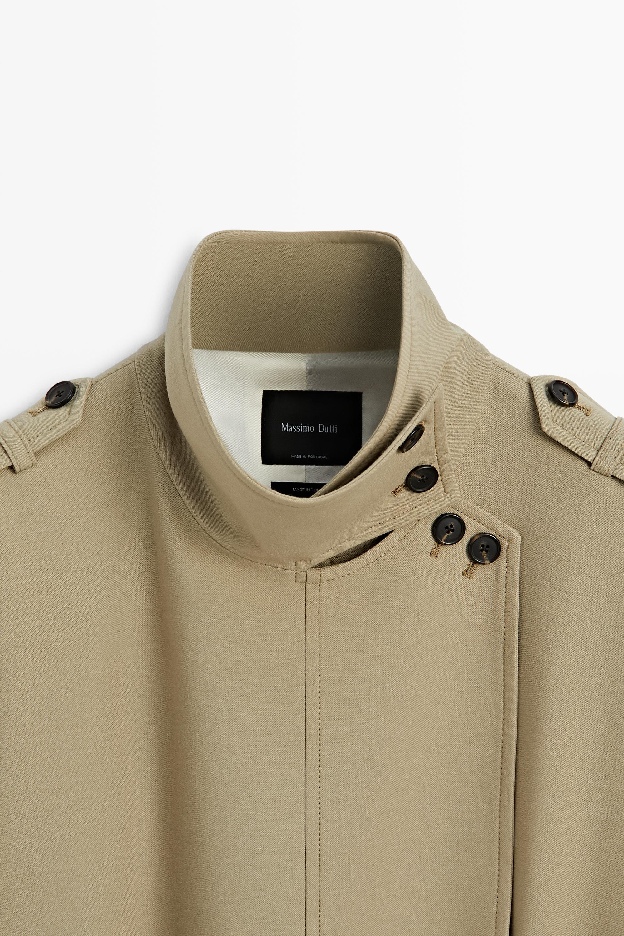 Mid-length belted trench coat