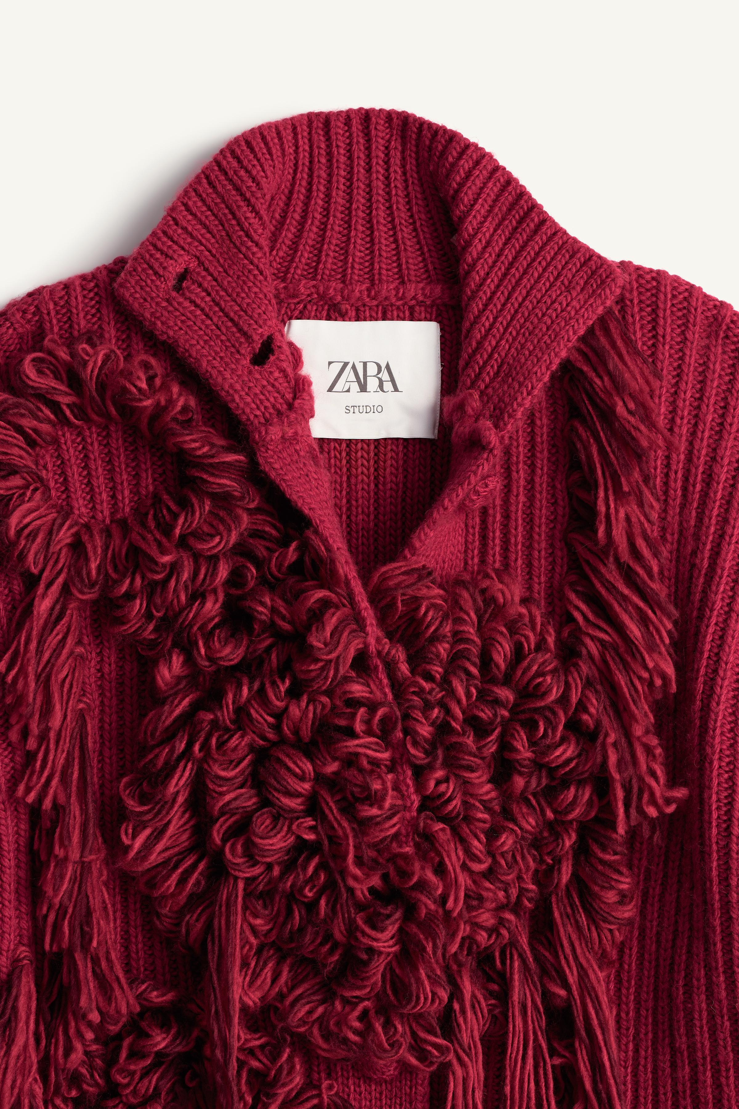 LIMITED EDITION FRINGED KNIT COAT