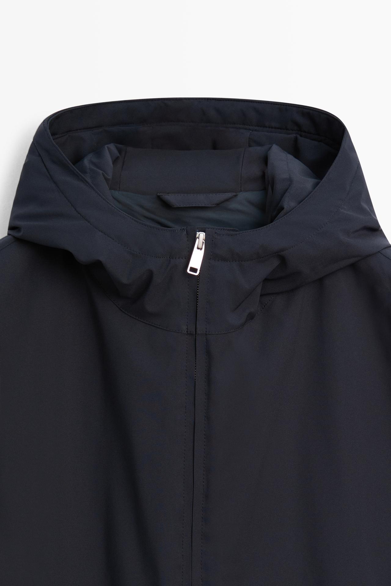 Long quilted hooded parka — Navy blue