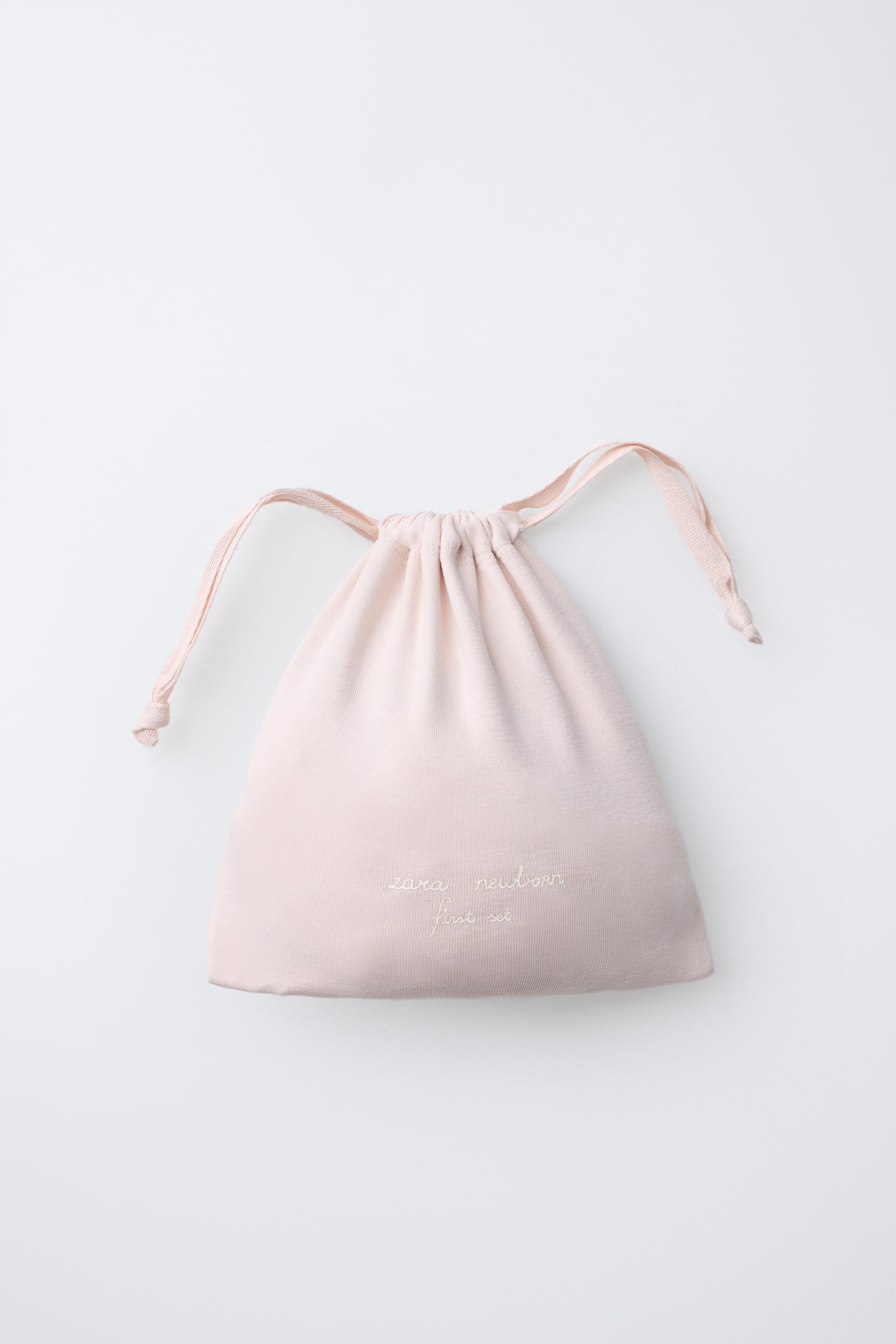 LAYETTE SET WITH POUCH