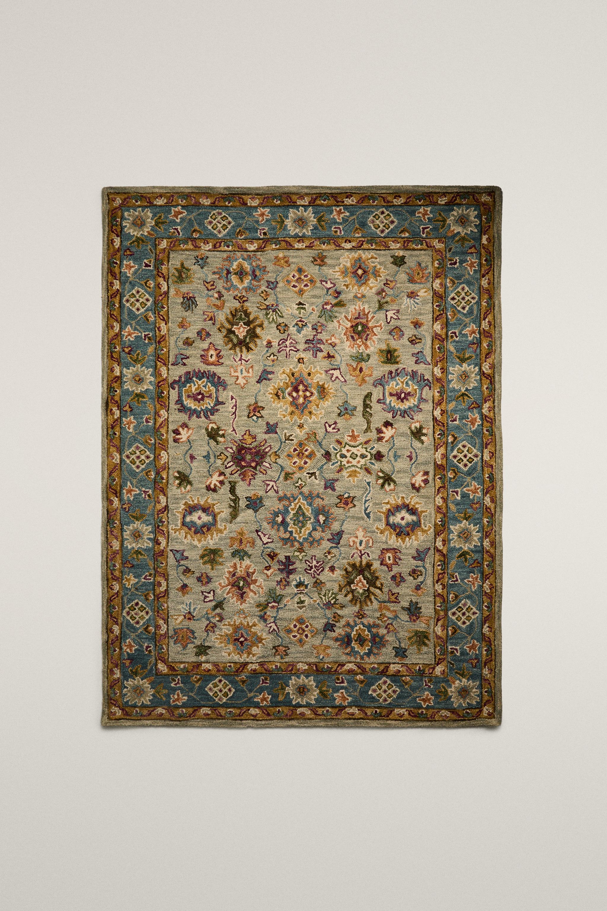 SYMMETRICAL FLORAL PRINT WOOL AREA RUG