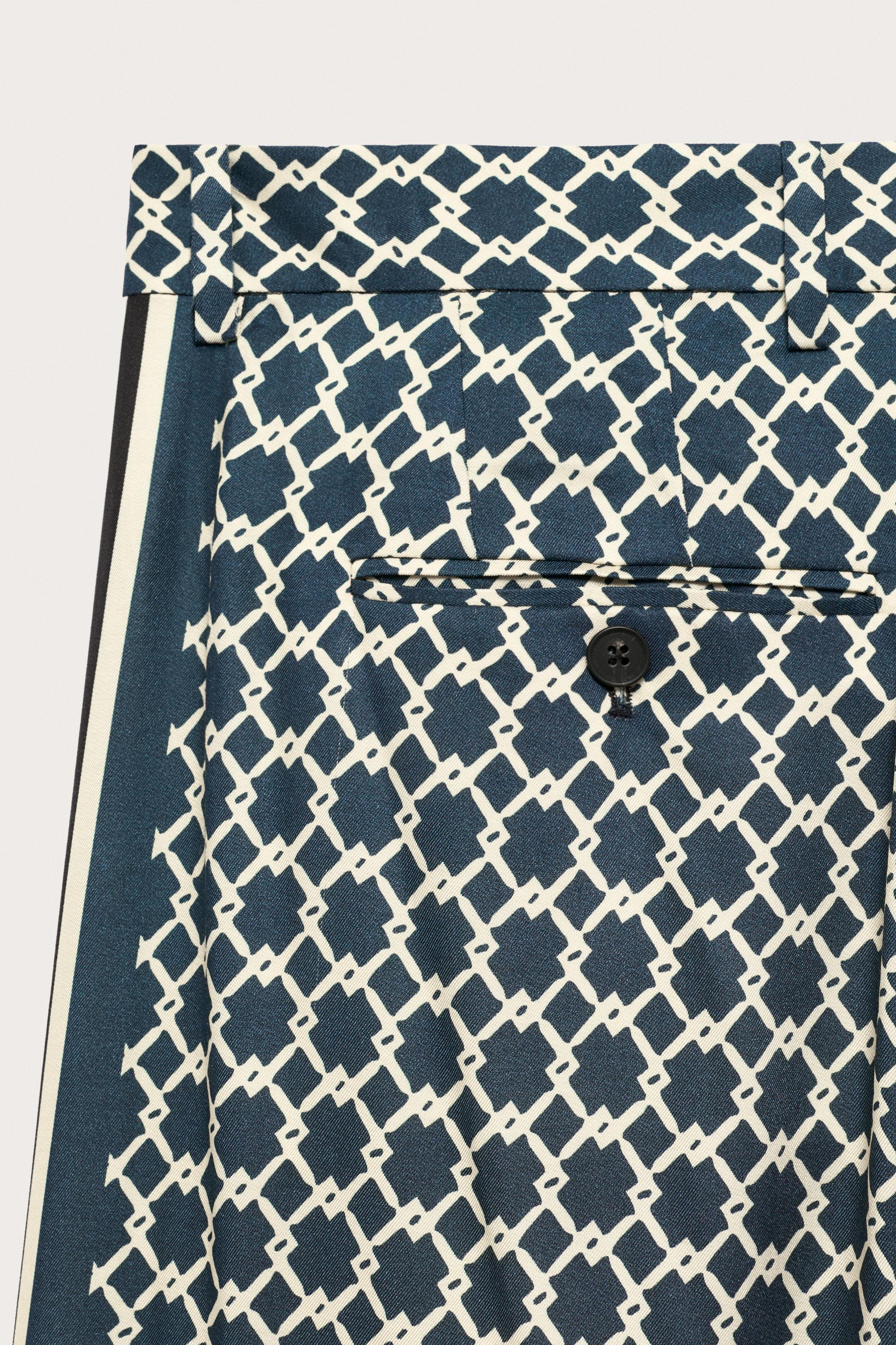 LIMITED EDITION FLOWY PANTS WITH SIDE BANDS