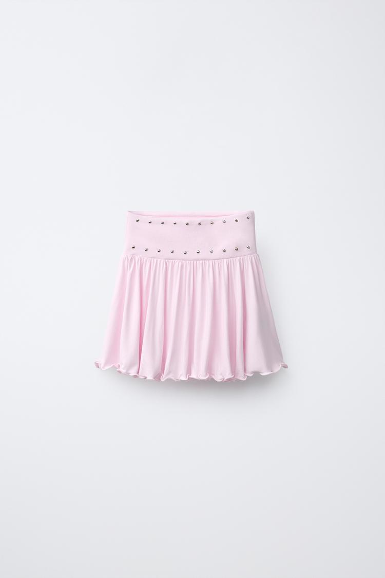 FALDA CON VOLANTES Y TACHAS 2