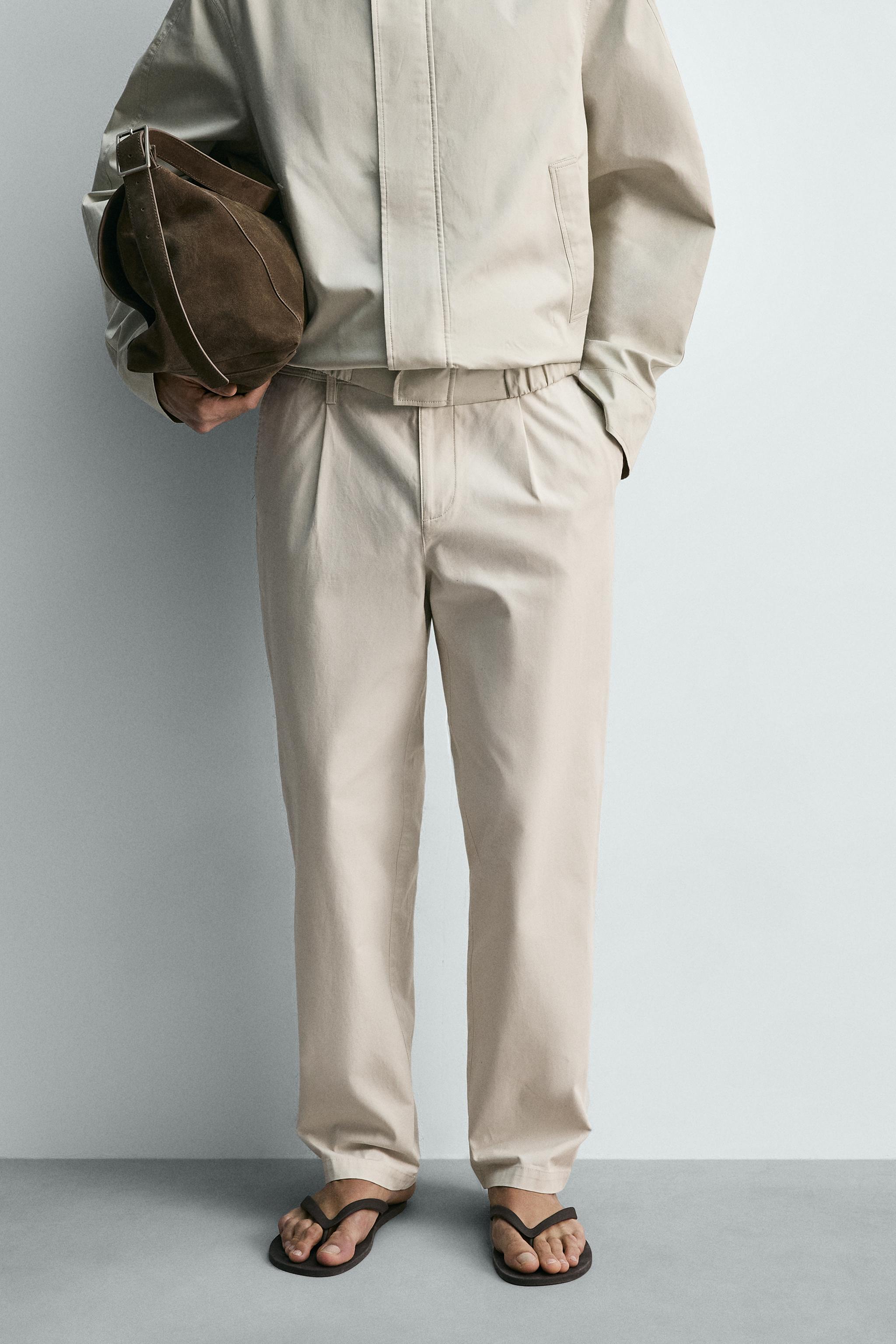 PLEATED STRAIGHT FIT PANTS