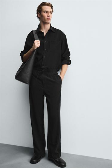 RELAXED FIT FLOWING TROUSERS - Black by Zara