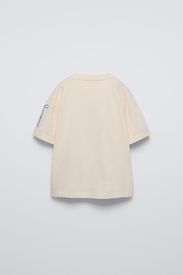 T-SHIRT AVEC DÉCOR NOEUD - Blanc cassé de Zara - Image 1