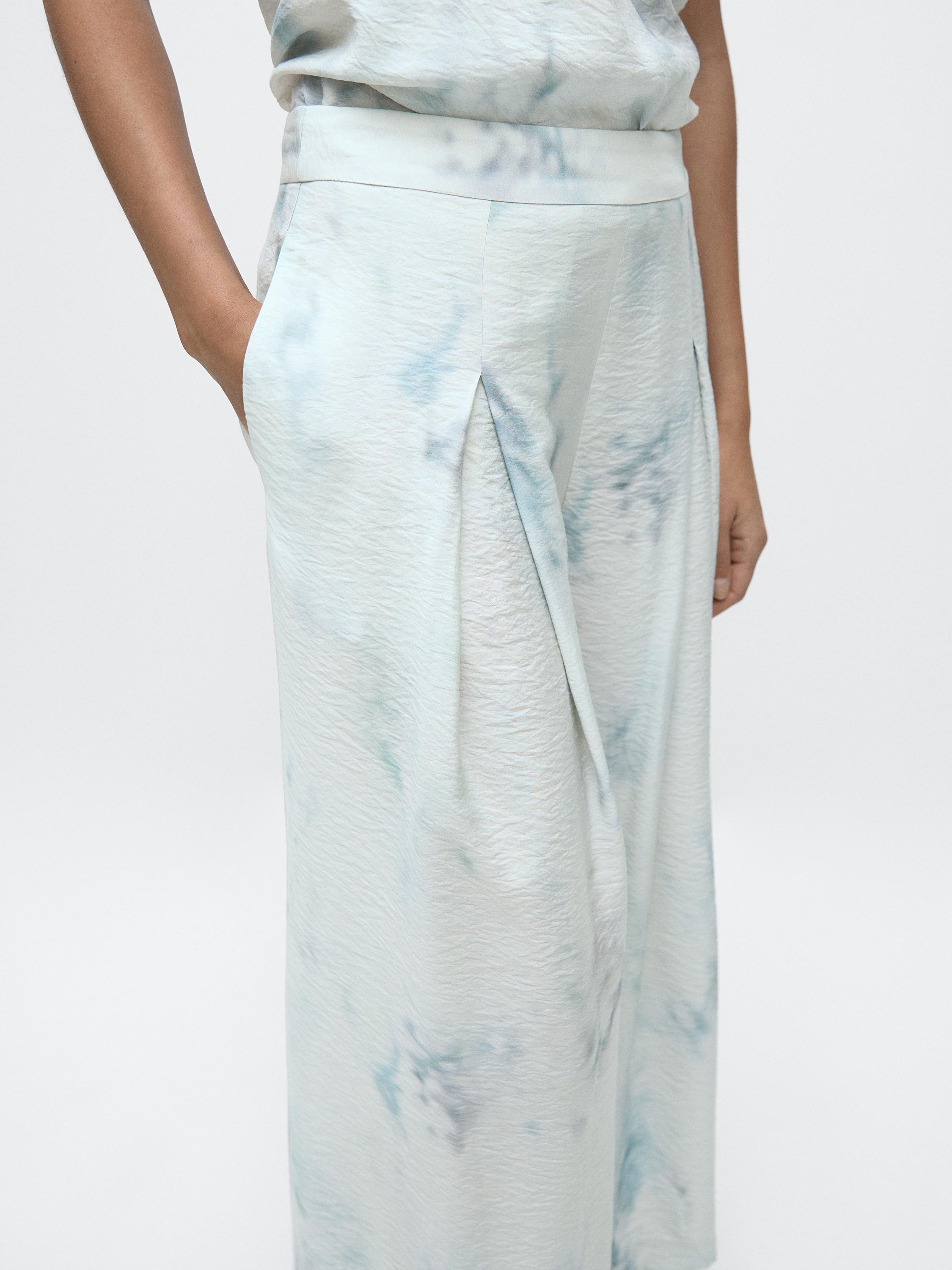 Printed trousers with pleat details