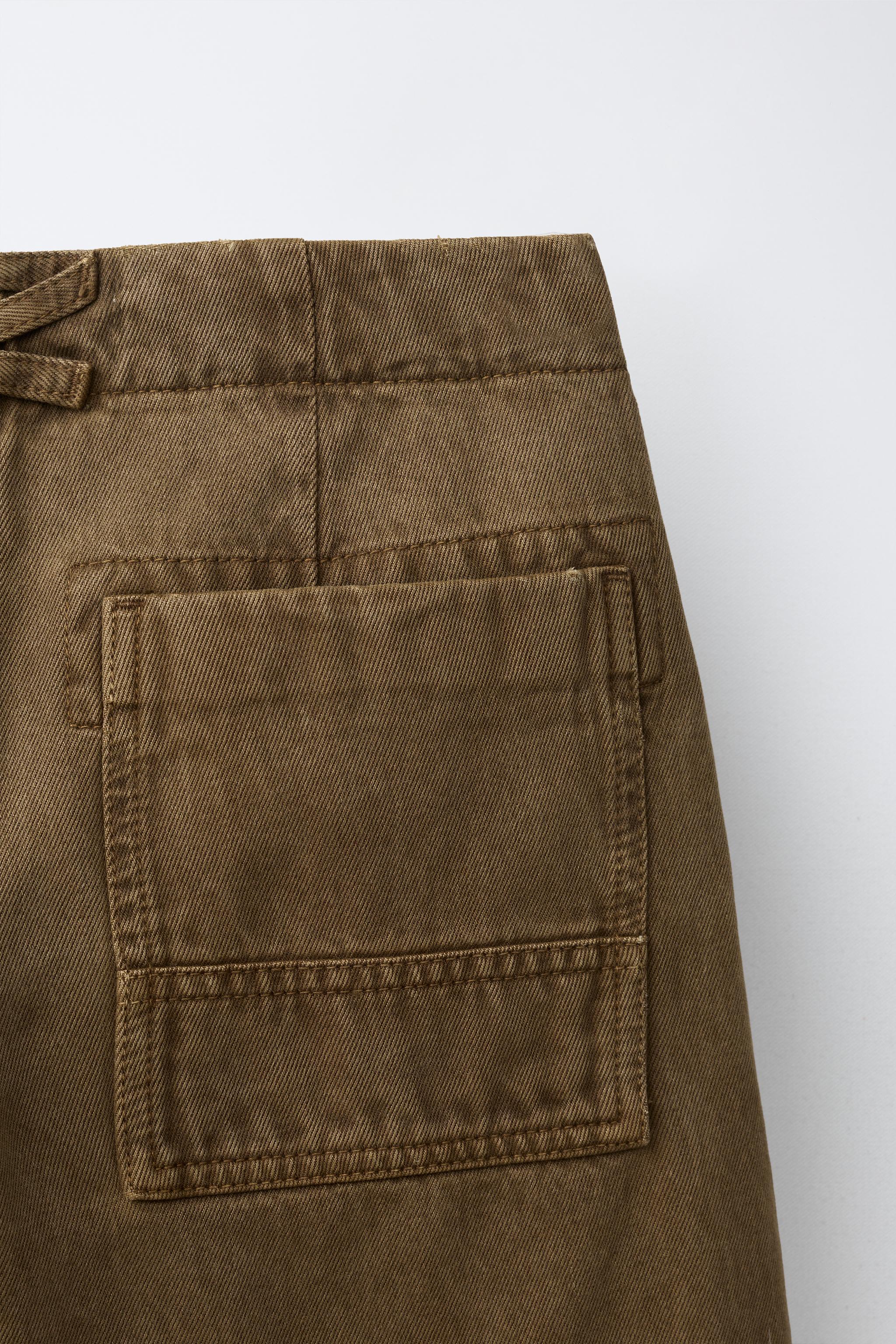 RELAXED PLEATED PANTS