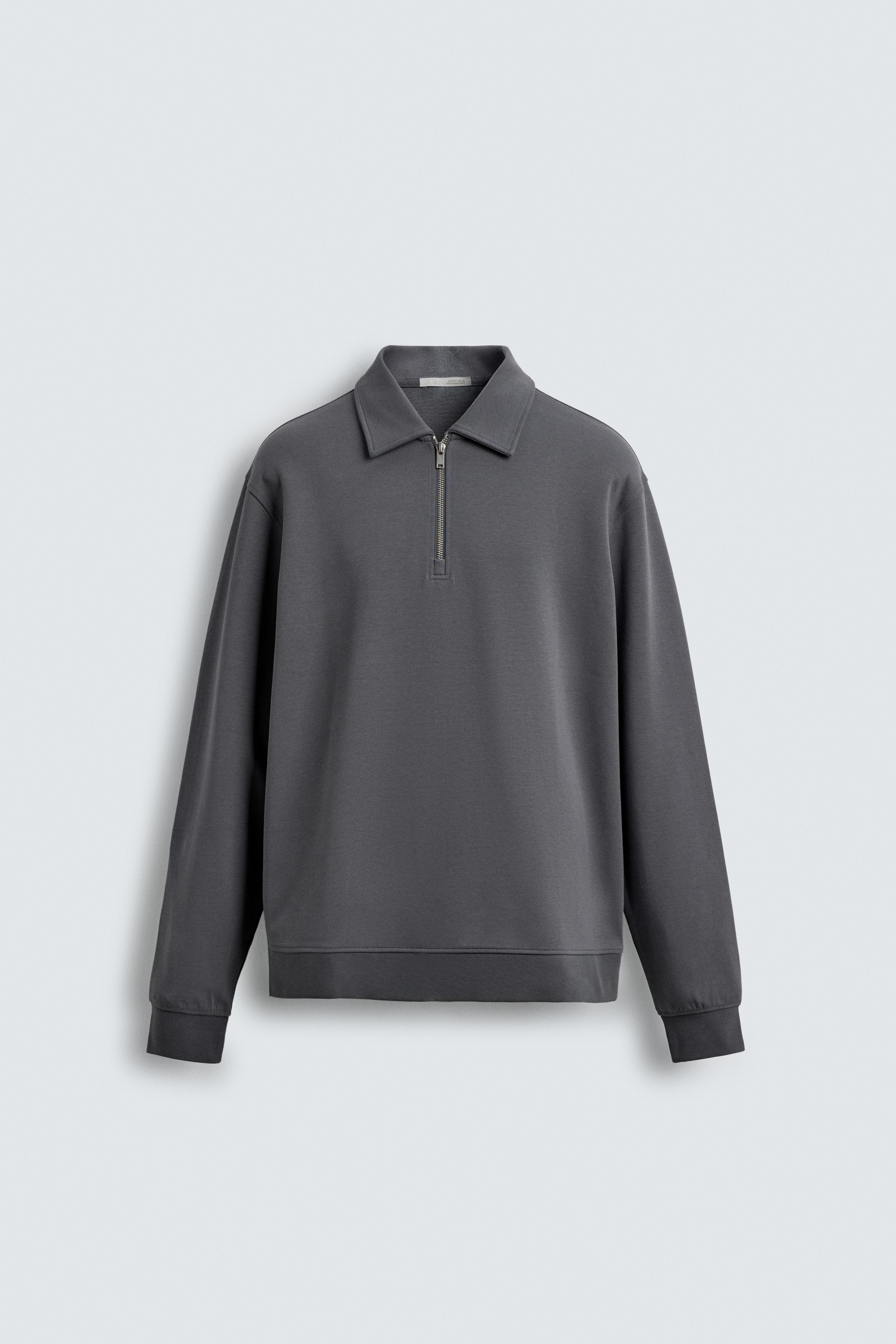 INTERLOCK ZIP POLO SWEATSHIRT