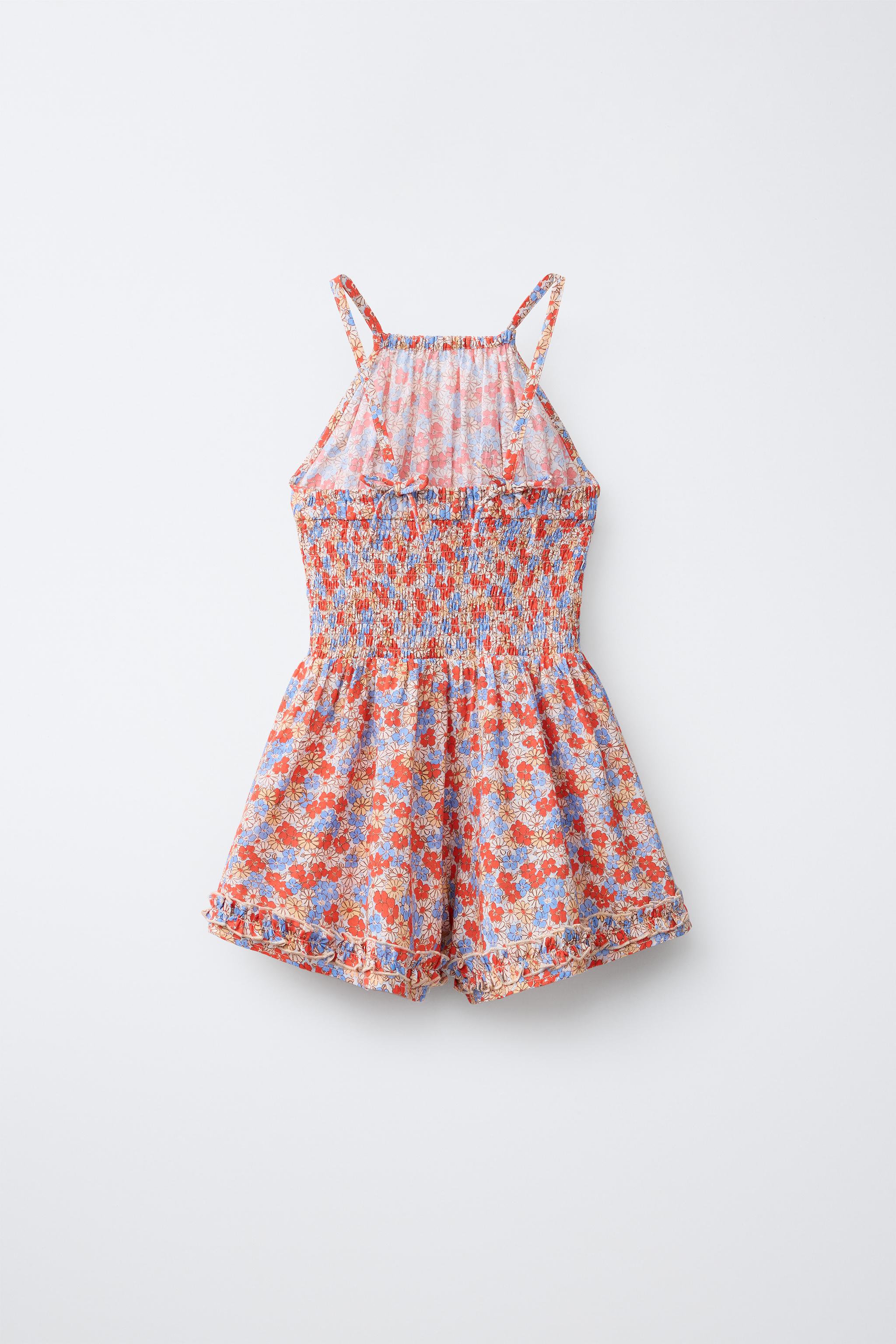 SHORT RUFFLED FLORAL JUMPSUIT