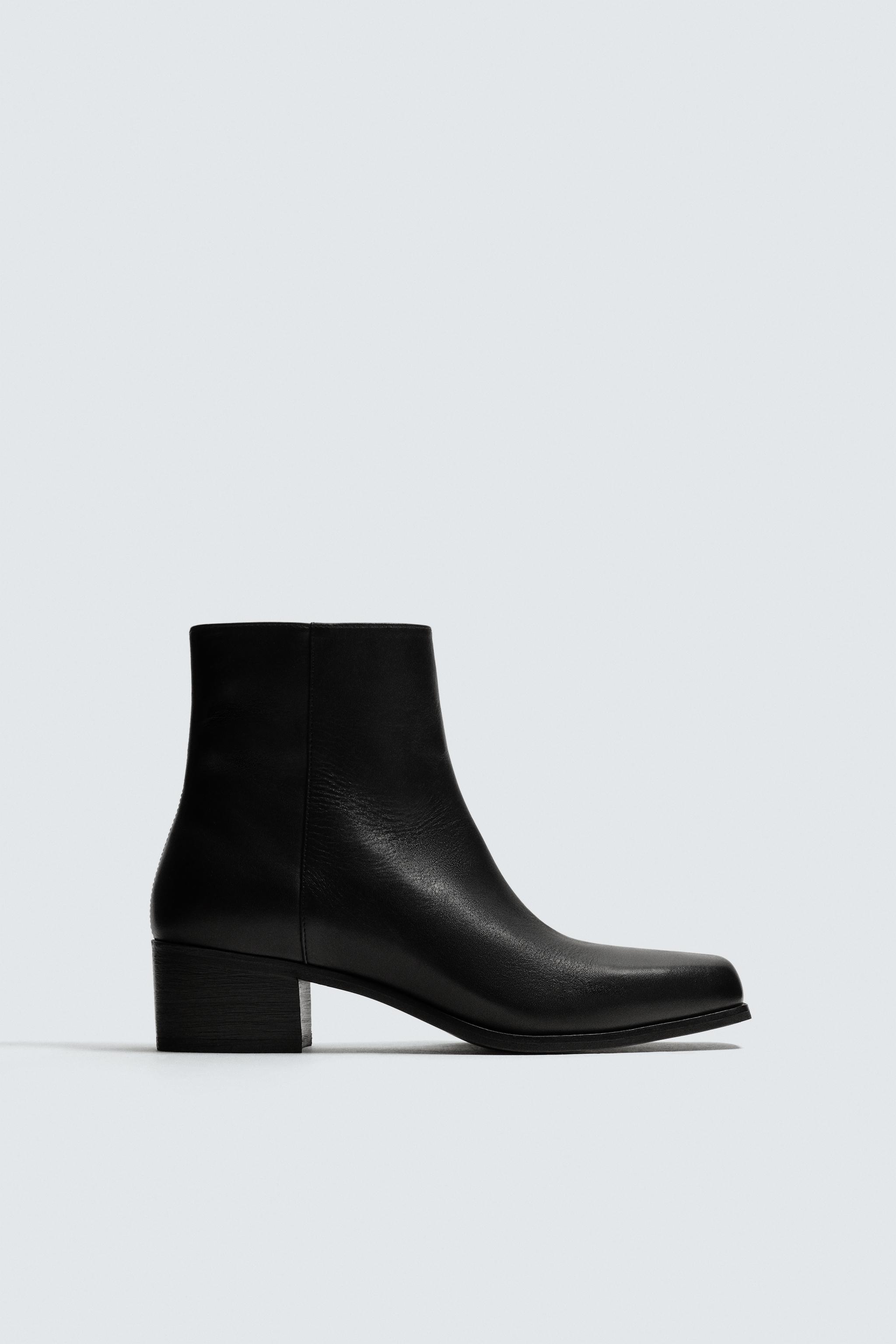 BOTTES EN CUIR À TALONS