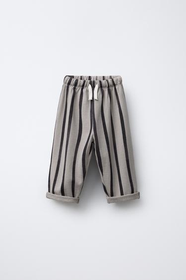 PANTALÓN FELPA BAGGY RAYAS - Arena / Negro de Zara