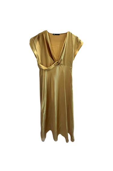 Front view of a gold dress with a V-neck and short sleeves.