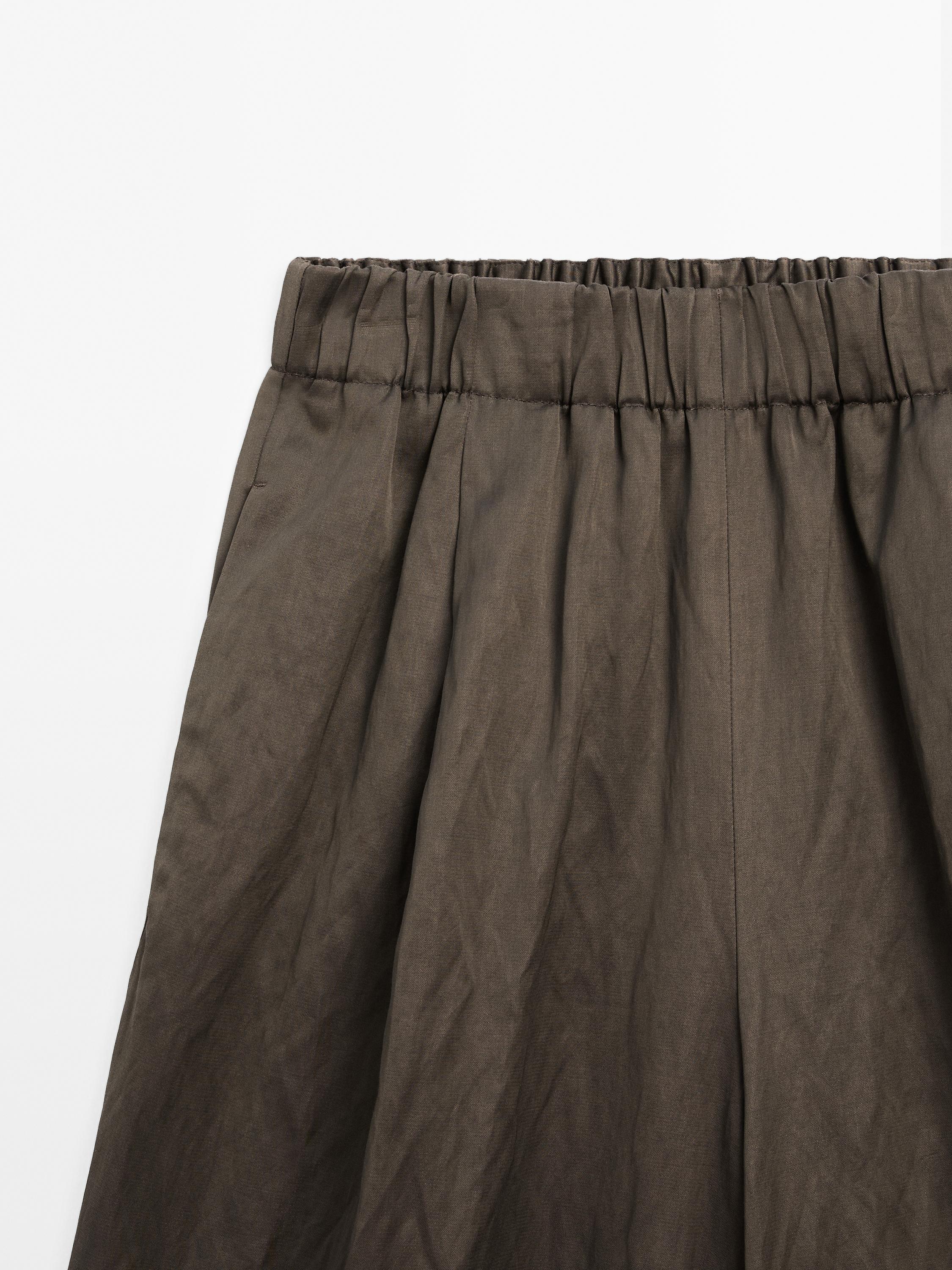 Wide-leg satin trousers with creased effect