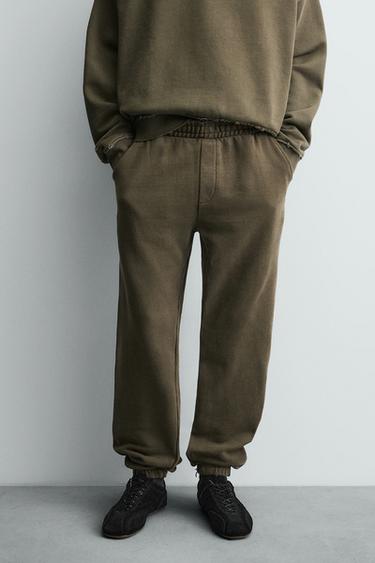 RELAXED FIT FADED EFFECT TROUSERS - Khaki by Zara