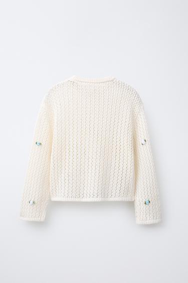 PULL RÉSILLE AVEC FLEURS APPLIQUÉES - Écru de Zara - Image 1