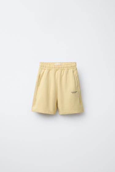 SLOGAN PRINT JOGGING BERMUDA SHORTS - Butter by Zara