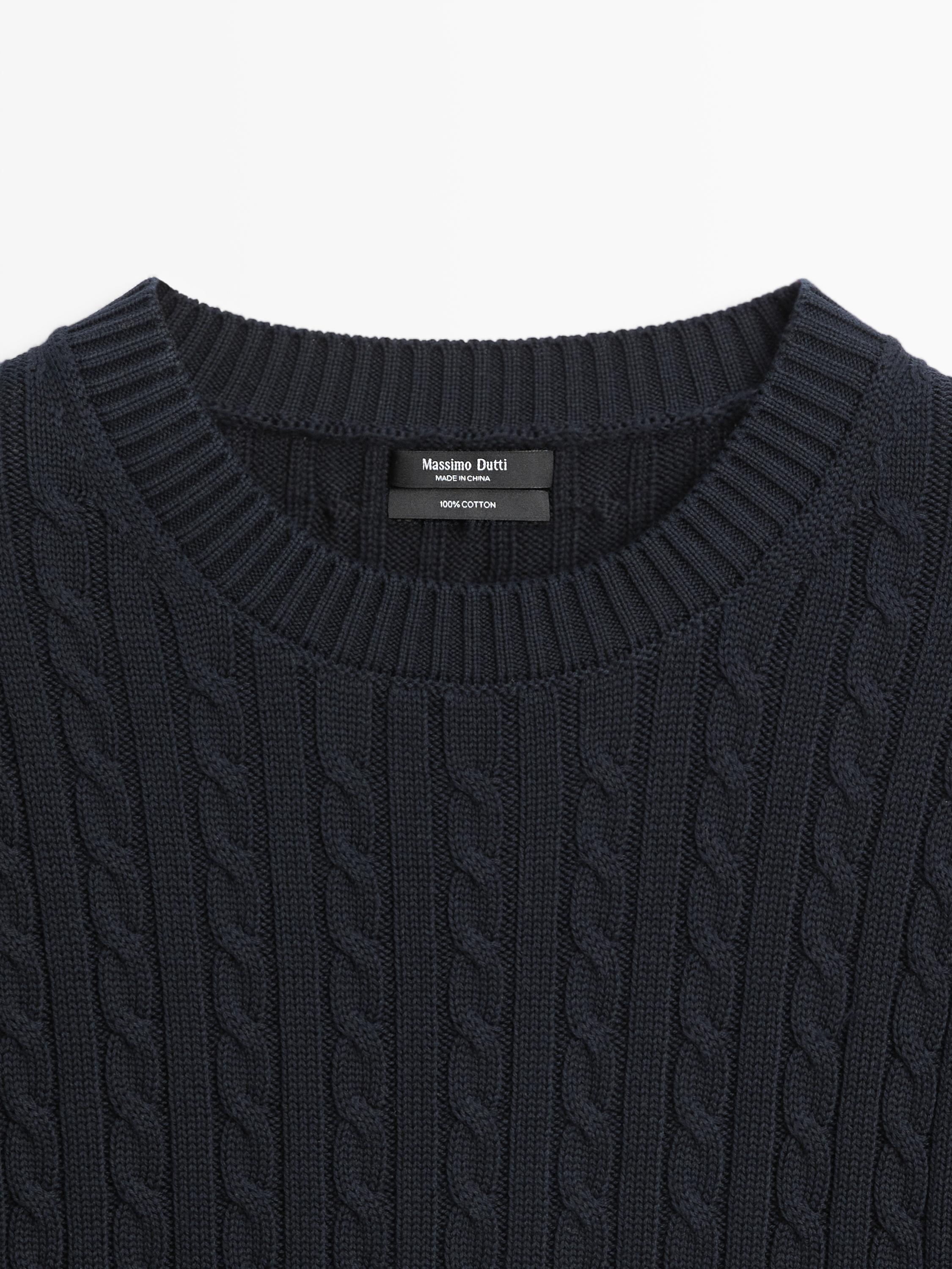 Short sleeve cable-knit sweater