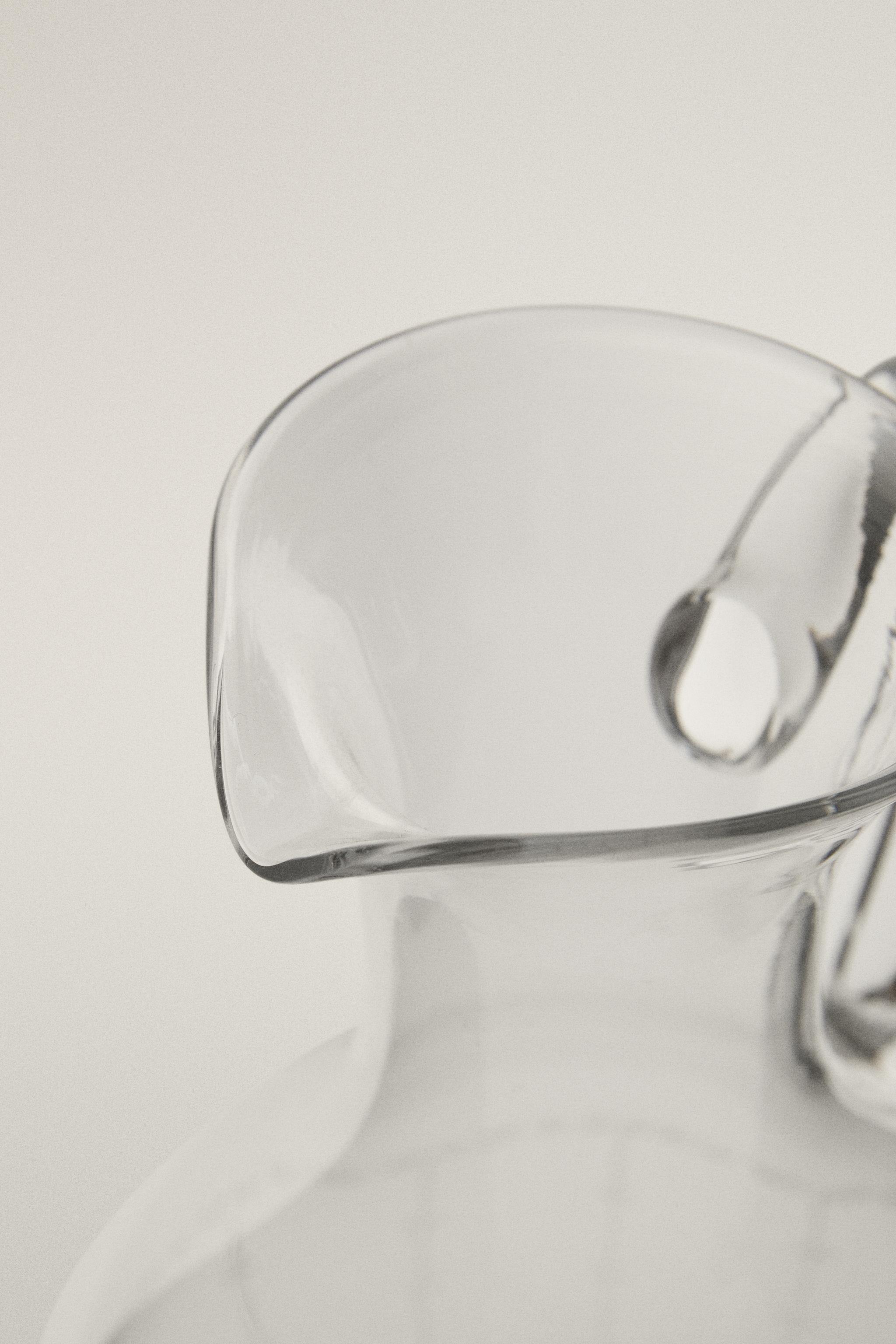 GEOMETRICALLY ENGRAVED GLASS PITCHER