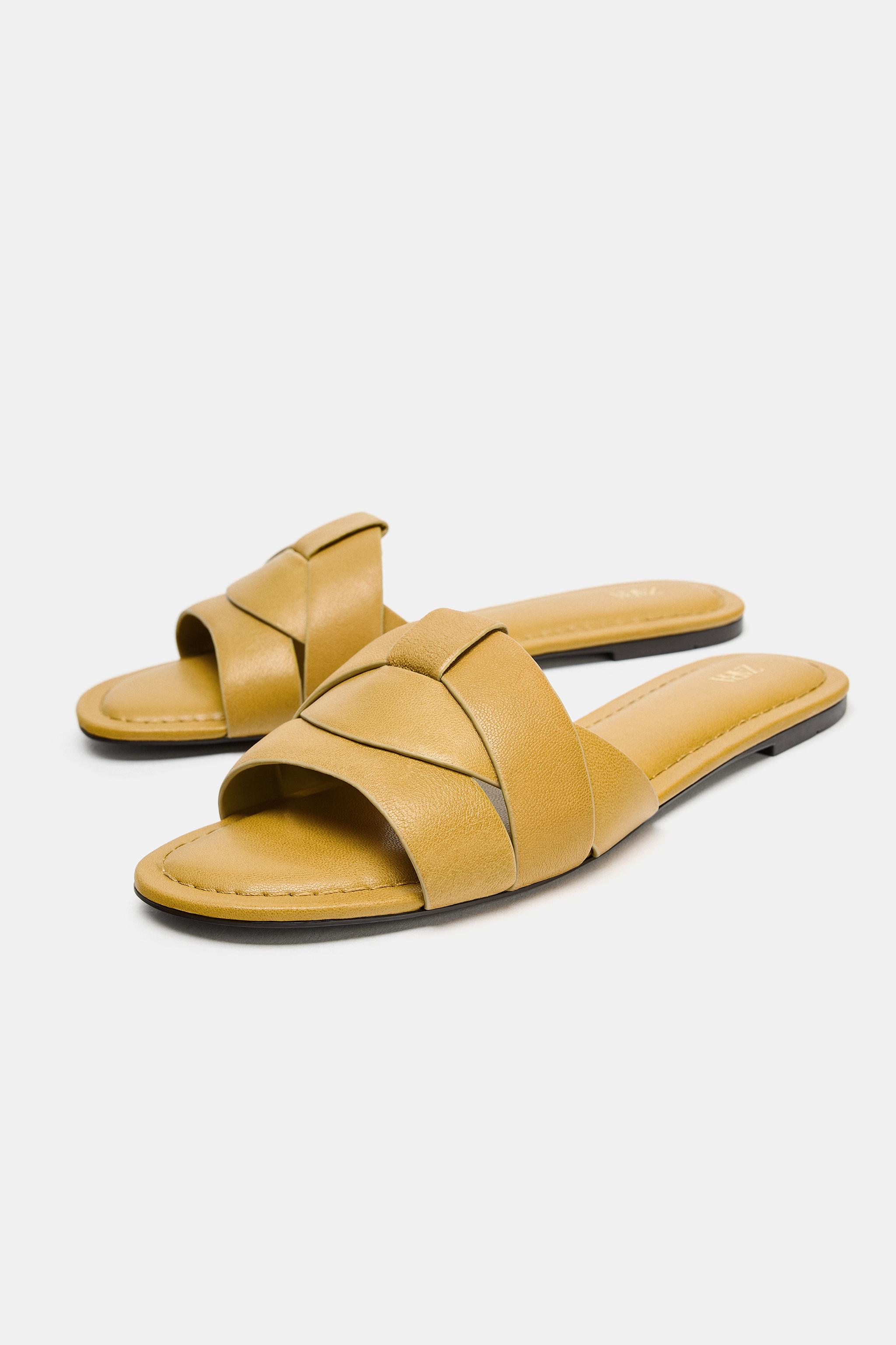 FLAT CROSSED-STRAP LEATHER SANDALS