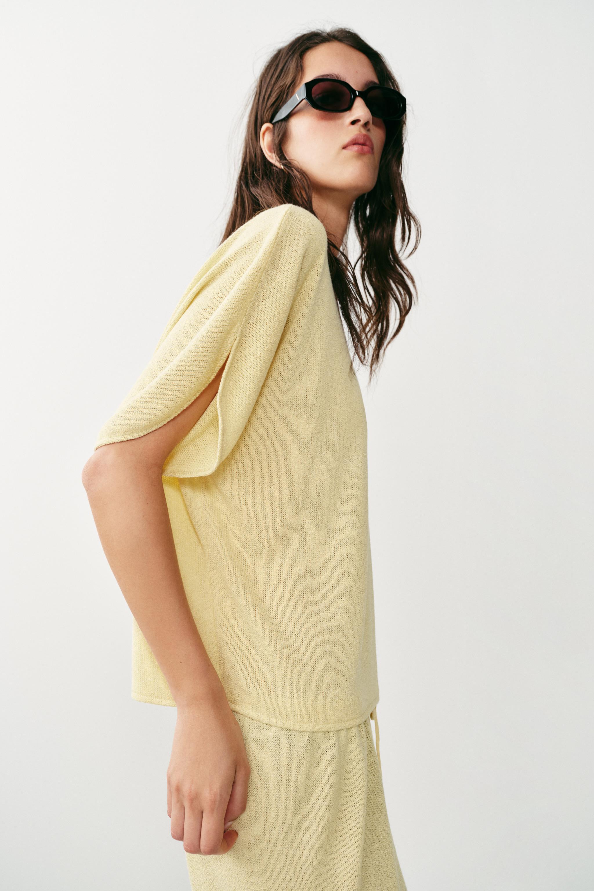 RUSTIC CAPE SLEEVE TOP