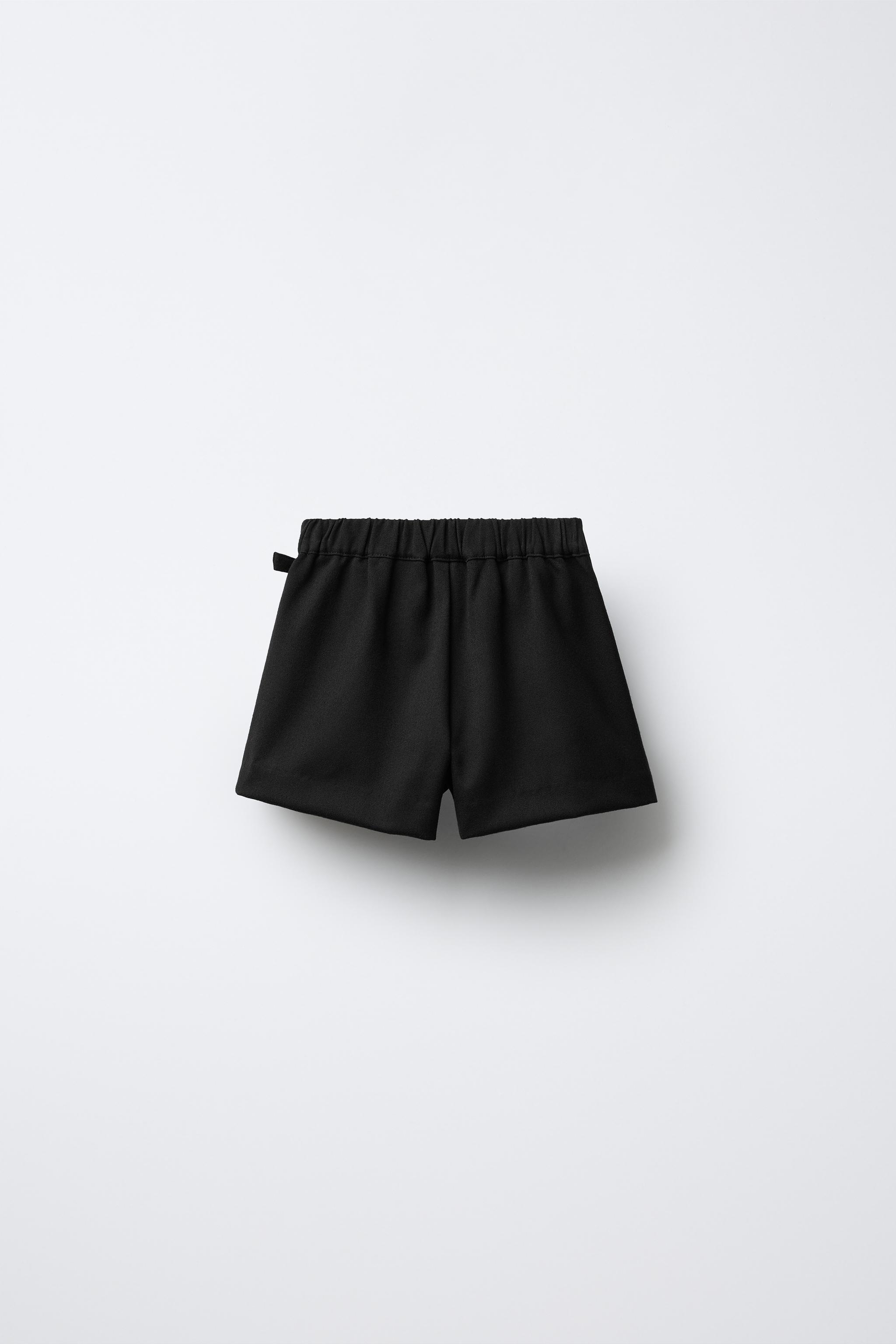 BUCKLE SKORT