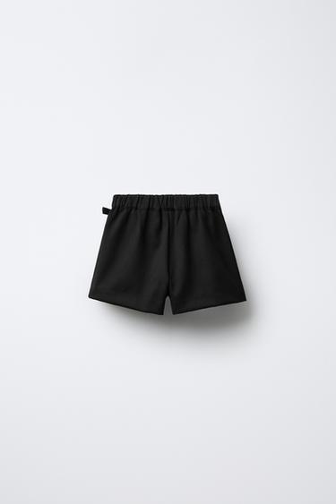 JUPE-SHORT À PLIS PLATS AVEC BOUCLE - Noir de Zara - Image 1