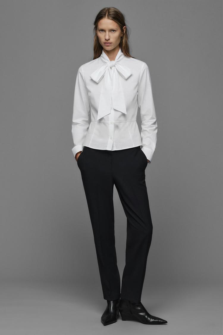 PEPLUM SHIRT WITH TIED DETAIL